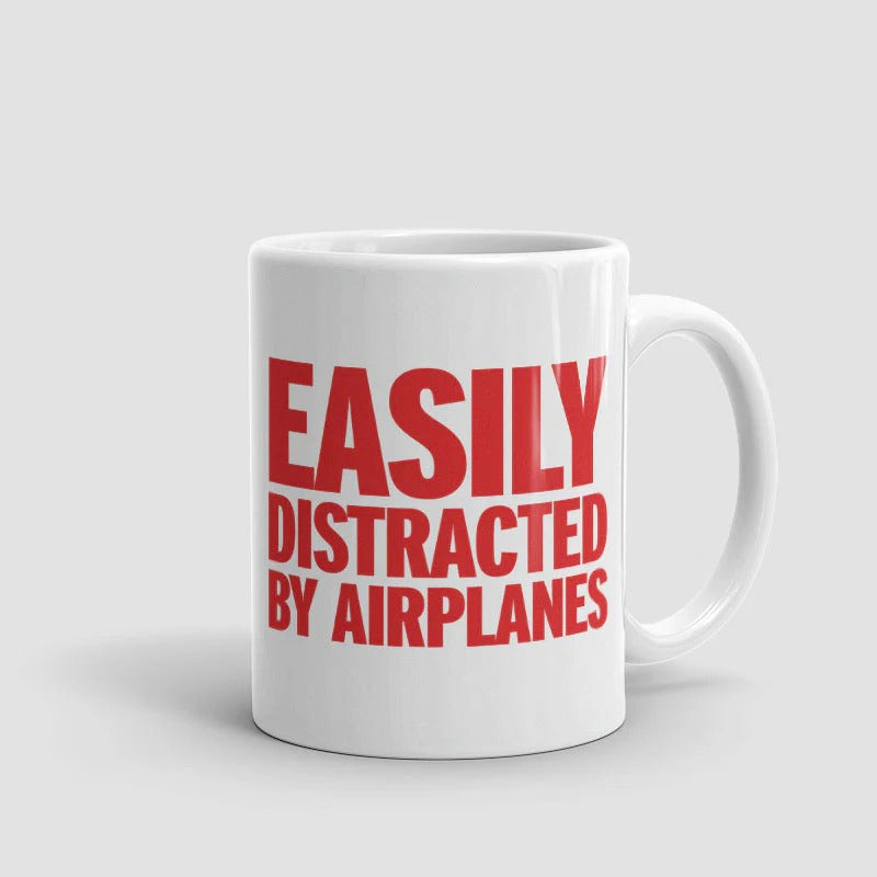 Taza "Me distraigo fácilmente con los aviones"