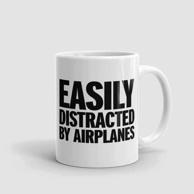 Taza "Me distraigo fácilmente con los aviones"